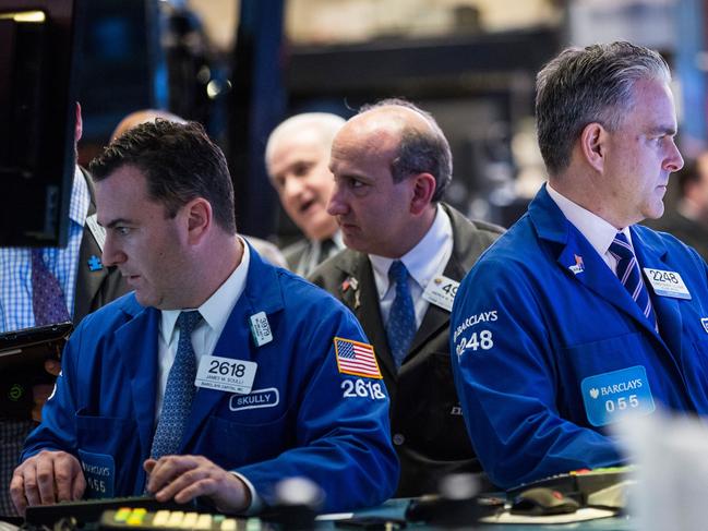 NEW YORK, NY - DECEMBER 04: Traders work on the floor of the New York Stock Exchange during the afternoon of December 4, 2015 in New York City. The market closed more than 370 points up due to positive jobs report data. Andrew Burton/Getty Images/AFP == FOR NEWSPAPERS, INTERNET, TELCOS & TELEVISION USE ONLY ==