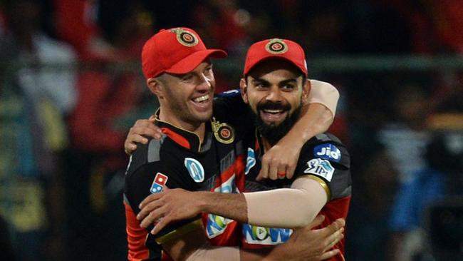 In his first stint in the IPL, Head was used as a lookalike decoy for superstar teammate AB de Villiers (L). Picture: Getty