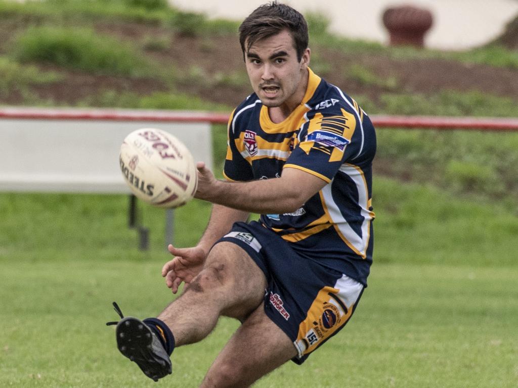 Cory Haywood kicks for Highfields. Picture: Nev Madsen.