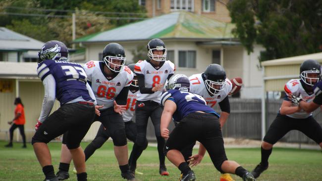 Fraser Kahl (NO.66) protecting the quarterback on the O-line.