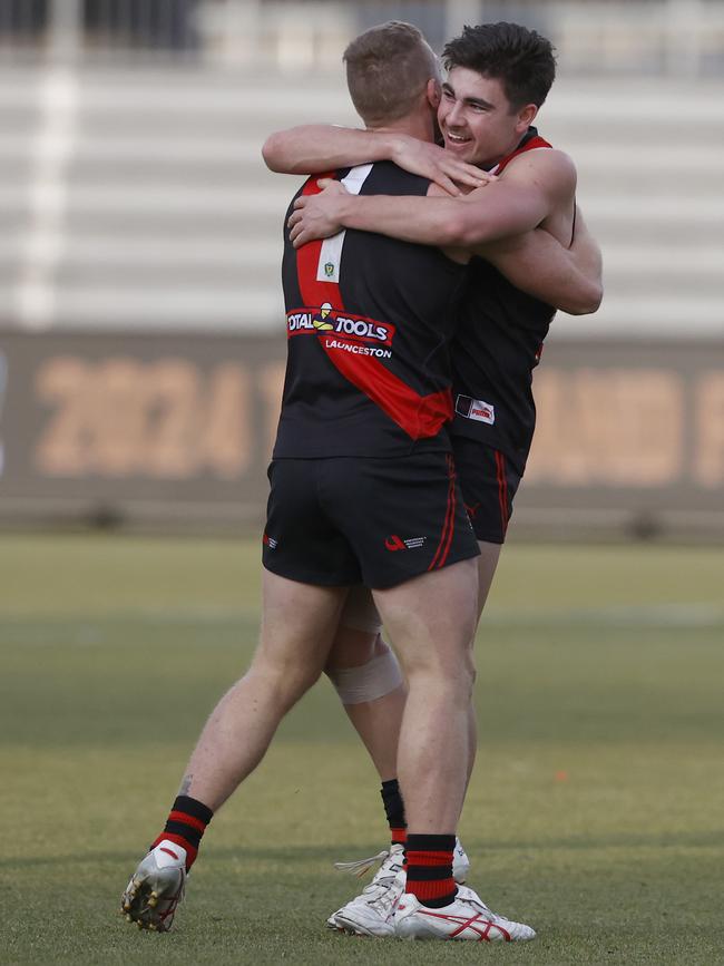 Brad Cox-Goodyer with team mate Declen Chugg after North Launceston won. TSL grand final 2024 - North Launceston V Lauderdale. Picture: Nikki Davis-Jones