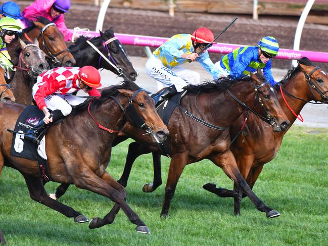 MELBOURNE, AUSTRALIA - SEPTEMBER 16:  Regan Bayliss riding Catchy wins Race 5, Danehill Stakes during Melbourne Racing at Flemington Racecourse on September 16, 2017 in Melbourne, Australia.  (Photo by Vince Caligiuri/Getty Images)