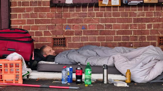 Homeless people and their belongings seen near Melbourne’s Queen Victoria market. Picture: Luis Ascui