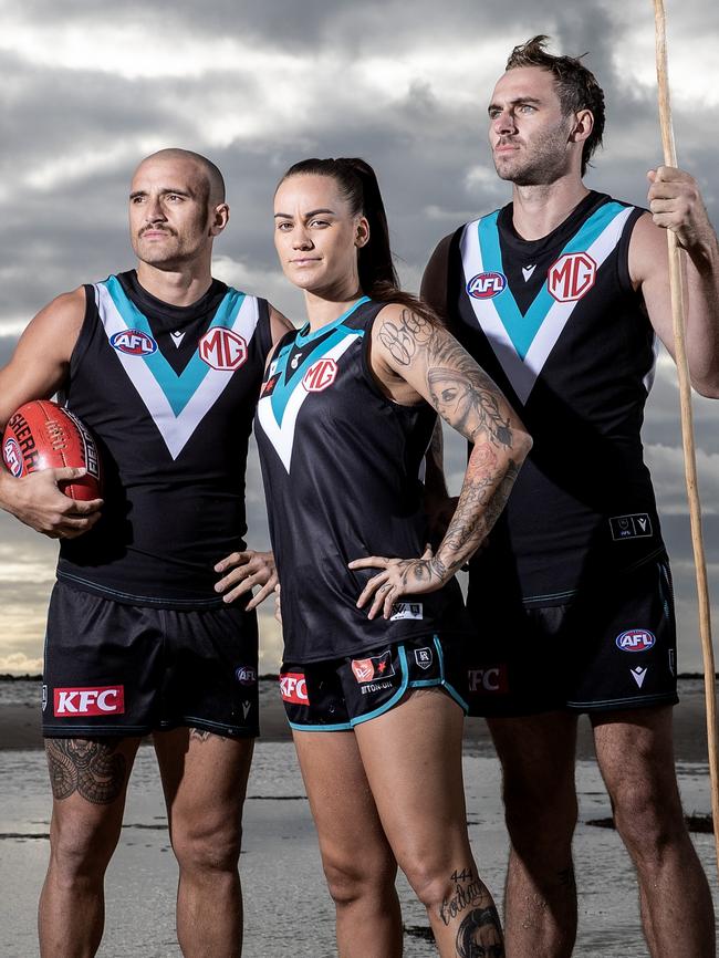 Powell-Pepper and Finlayson with Power AFLW player Gemma Houghton. Picture Sarah Reed