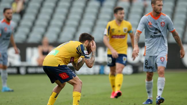 Daniel De Silva reacts after hitting the post. Photo: Ashley Feder/Getty Images