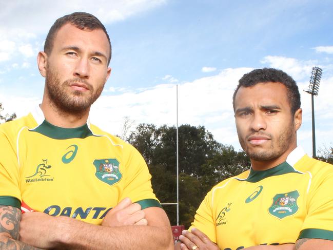 ##ON HOLD ## DO NOT USE HOLD#### CONTACT COURIER MAIL SPORTS EDITOR ### L to R, Quade Cooper with Will Genia, after the Wallabies team shot, Ballymore Herston - Photo Steve Pohlner