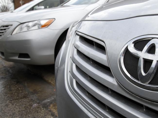 FILE - In this Feb. 6, 2010 file photo, Toyota cars are lined up for service at a Toyota dealership in Lincolnwood, Ill. Toyota is expected to agree on Monday to pay a fine of more than $16 million for a four-month delay in telling the government about defective gas pedals on its vehicles, the largest civil penalty imposed on an automaker by the government, a Transportation Department official said Sunday, April 18, 2010. (AP Photo/Nam Y. Huh, File)