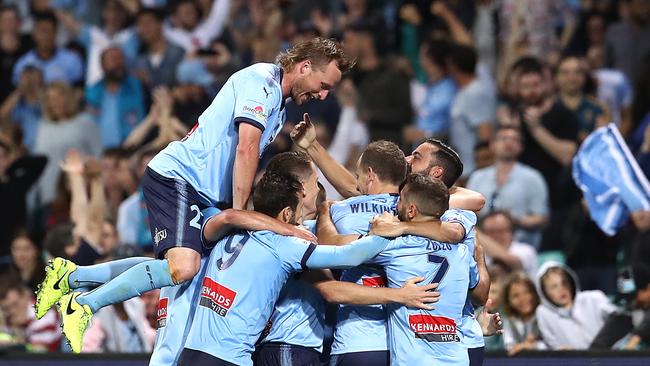 Ryhan Grant of Sydney FC celebrates after Alex Brosque of Sydney FC scored his team’s second goal during the round two A-League match between Sydney FC and Western Sydney Wanderers. Picture: Getty