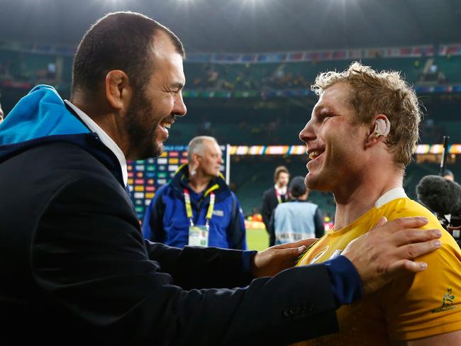 Michael Cheika congratulates David Pocock after Australia’s semi-final win over Argentina.