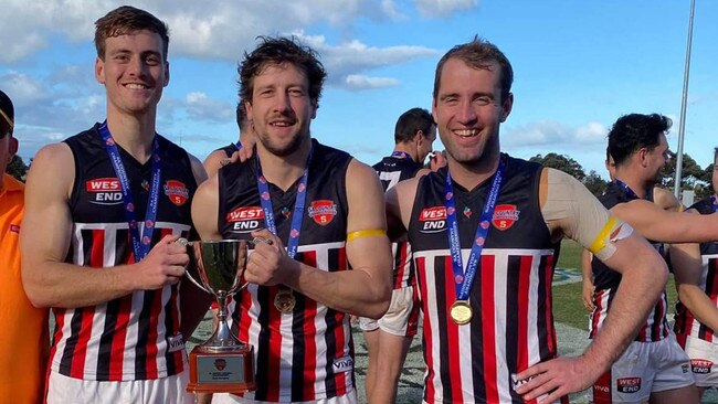 Todd Reid (left) with South Gambier playing-coach Brayden Kain and teammate James Prapotny. Picture: South Gambier Football Club