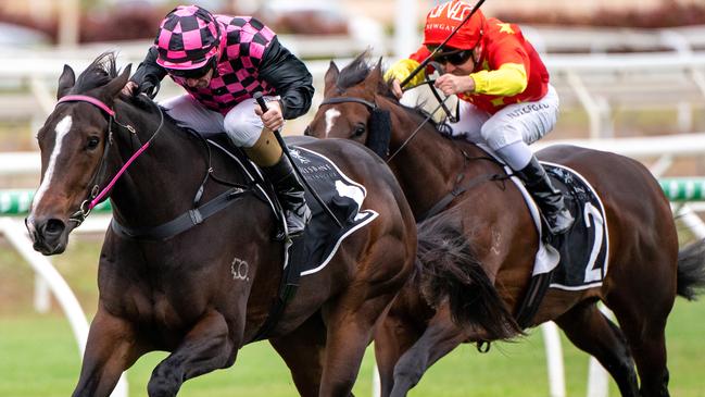 Jockey Jim Byrne rides Rothfire to victory in race 6, the Moet & Chandon Champagne Classic, during Eagle Farm Race Day at Eagle Farm Racecourse in Brisbane, Saturday, May 23, 2020. (AAP Image/Supplied by Michael McInally, Racing Queensland) NO ARCHIVING, EDITORIAL USE ONLY