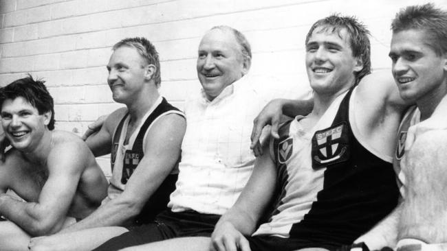 Nicky Winmar, right, with former St Kilda teammates Danny Frawley, Geoff Cunningham, coach Darrel Baldock and Tony Lockett.