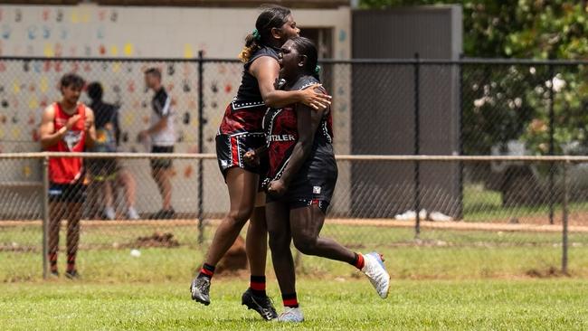 The Tiwi Bombers women celebrating in Round 9 of the 2024-25 NTFL season. Picture: Jack Riddiford / AFLNT Media