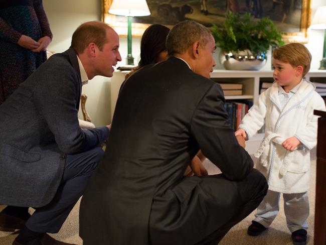 President Barack Obama, Prince William, Duke of Cambridge and First Lady Michelle Obama talks with Prince George at Kensington Palace on April 22, 2016 in London, England. The President and his wife are currently on a brief visit to the UK where they attended lunch with HM Queen Elizabeth II at Windsor Castle and later dinner with Prince William and his wife Catherine, Duchess of Cambridge at Kensington Palace. Photo by Pete Souza/The White House via Getty Images