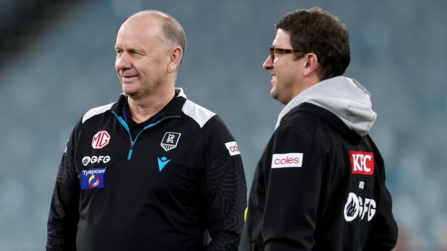 MELBOURNE, AUSTRALIA - AUGUST 10: Chad Cornes, Forwards Coach of the Power, Ken Hinkley, Senior Coach of the Power and Josh Carr, Midfield Coach of the Power look on prior to the round 22 AFL match between Melbourne Demons and Port Adelaide Power at Melbourne Cricket Ground, on August 10, 2024, in Melbourne, Australia. (Photo by Josh Chadwick/Getty Images)