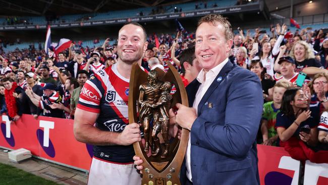 SYDNEY, AUSTRALIA - OCTOBER 06: Roosters captain Boyd Cordner and coach Trent Robinson celebrate victory with fans after the 2019 NRL Grand Final match between the Canberra Raiders and the Sydney Roosters at ANZ Stadium on October 06, 2019 in Sydney, Australia. (Photo by Matt King/Getty Images)