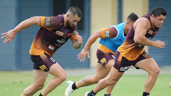 Jack Bird and James Roberts run during a Brisbane Broncos training session at Red Hill in Brisbane, Monday, January 7, 2019. (AAP Image/Jono Searle) NO ARCHIVING