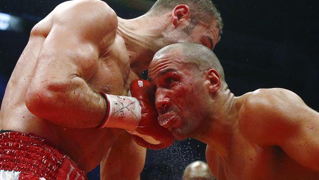 QUEBEC CITY, QC - NOVEMBER 29: Lucian Bute of Canada throws a punch to James Degale of England during their IBF super-middleweight championship fight at the Centre Videotron on November 29, 2015 in Quebec City, Quebec, Canada. (Photo by Mathieu Belanger/Getty Images) *** BESTPIX ***