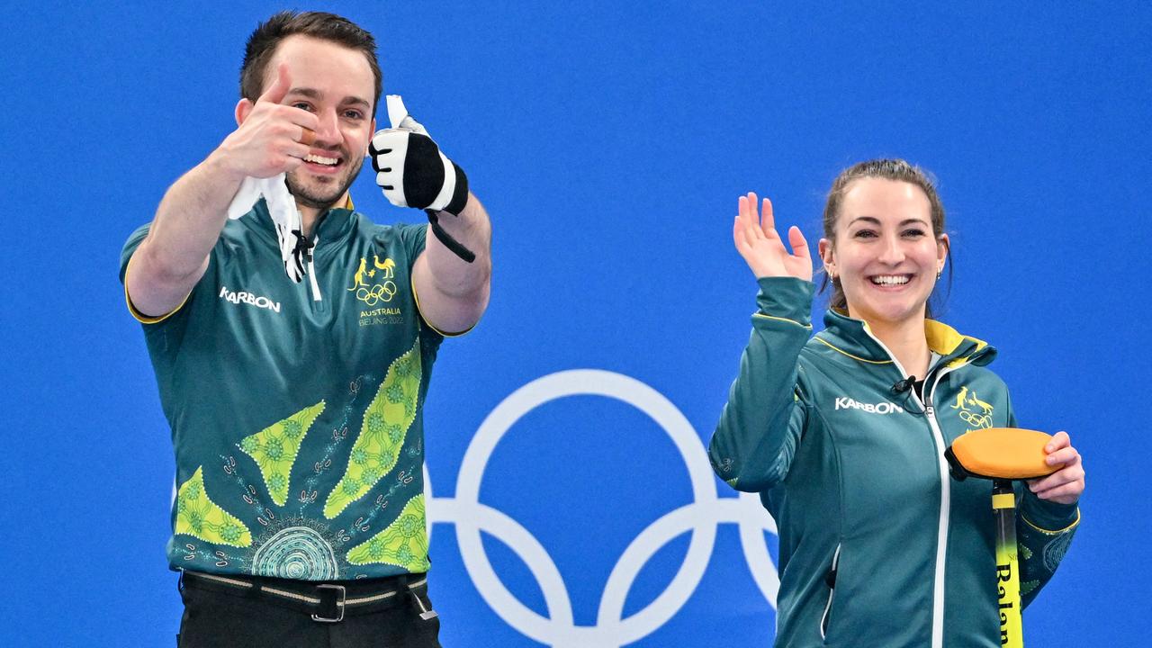 Australia's Tahli Gill and Australia's Dean Hewitt (L) during their win over Switzerland (Photo by Lillian SUWANRUMPHA / AFP)