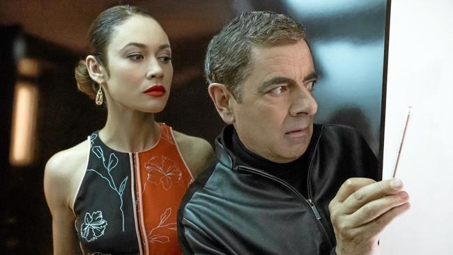 Olga Kurylenko and Rowan Atkinson in Johnny English Strikes Again. Picture: Giles Keyte/ Focus Features