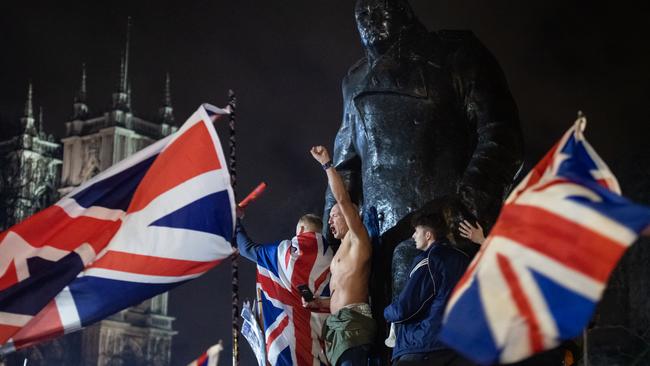 Pro Brexit supporters celebrate as the United Kingdom exits the EU. Picture: Getty