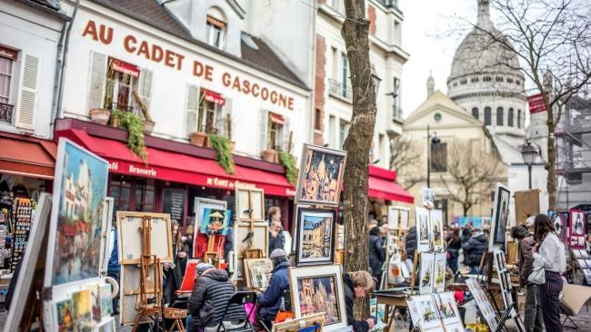 We visited the open square of Place du Tertre to watch artists sketch their waiting subjects.