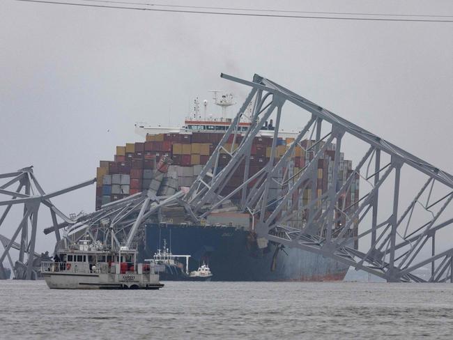 Workers continue to search for victims after the cargo ship Dali collided with the Francis Scott Key Bridge causing it to collapse. Picture: Getty Images/AFP