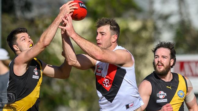 EFNL 2024: Mitcham defenders battle South Belgrave's Tim Smith. Picture: Leesa Clarkson