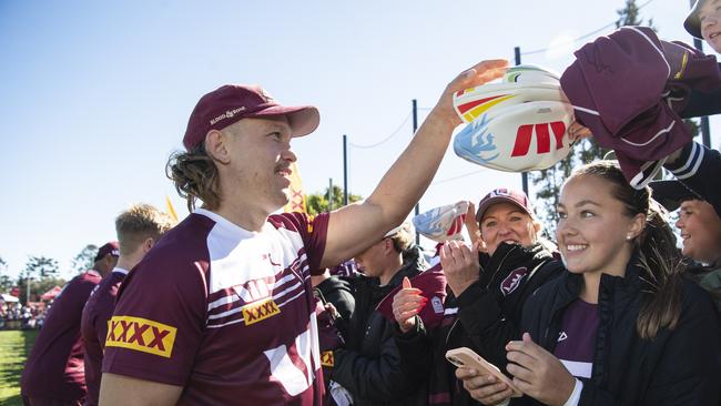 Reuben Cotter with fans from Ipswich Sally Abbott (centre left) and Gaby Muller at Queensland Maroons fan day at Toowoomba Sports Ground, Tuesday, June 18, 2024. Picture: Kevin Farmer