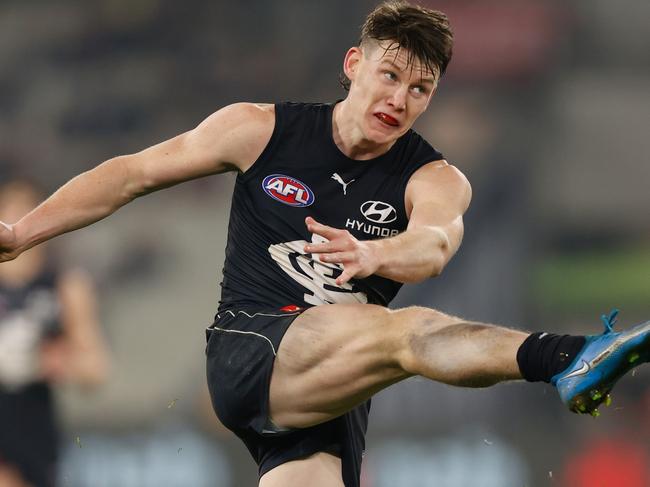 MELBOURNE, AUSTRALIA - JULY 10: Sam Walsh of the Blues kicks a goal during the 2021 AFL Round 17 match between the Carlton Blues and the Geelong Cats at the Melbourne Cricket Ground on July 10, 2021 in Melbourne, Australia. (Photo by Michael Willson/AFL Photos via Getty Images)