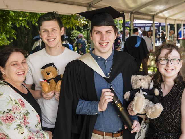 Bachelor of Business graduate Trent Mason with family (from left) Susan Mason, Brandon Mason and Laura Berry at a UniSQ graduation ceremony at Empire Theatres, Tuesday, October 31, 2023. Picture: Kevin Farmer