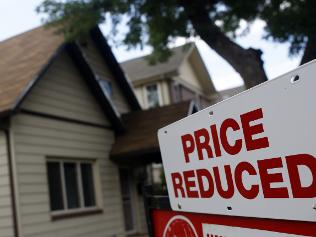 Inflation and rising house prices are key reasons behind yesterday's interest rate hike / AP