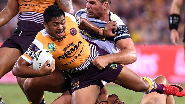 Anthony Milford of the Broncos is tackled during the round two NRL match between the Brisbane Broncos and the North Queensland Cowboys at Suncorp Stadium on March 16, 2018 in Brisbane, Australia. (Photo by Bradley Kanaris/Getty Images)