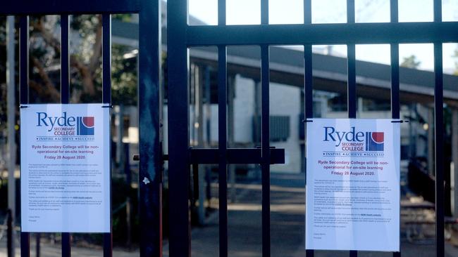 A sign outside Ryde Secondary College in Sydney after being closed due to a staff member testing positive for coronavirus. New strategic age-targeted viral testing will protect older people from COVID-19 exposure and children and young adults from needless school closures. Picture: News Corp