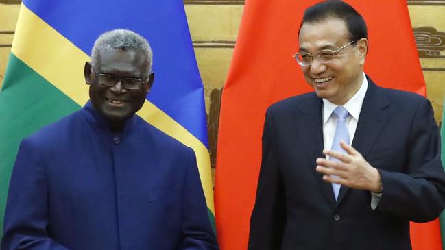 Solomon Islands Prime Minister Manasseh Sogavare meets with Chinese Premier Li Keqiang in Beijing in 2019. Picture: Getty Images