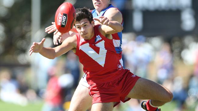 Ben Jarman (North Adelaide) attempts to mark during the second quarter. Central District v North Adelaide, at Elizabeth Oval, Good Friday SANFL Football. 25/03/16 Picture: Stephen Laffer