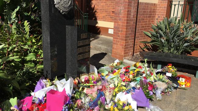 Flowers outside the Toowoomba police station. Picture: Liam Kidston