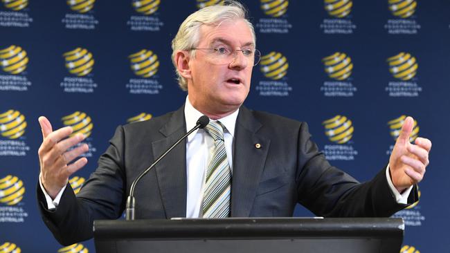 FFA chairman Steven Lowy explains his decision to step down to the media in Sydney yesterday. Picture: AAP