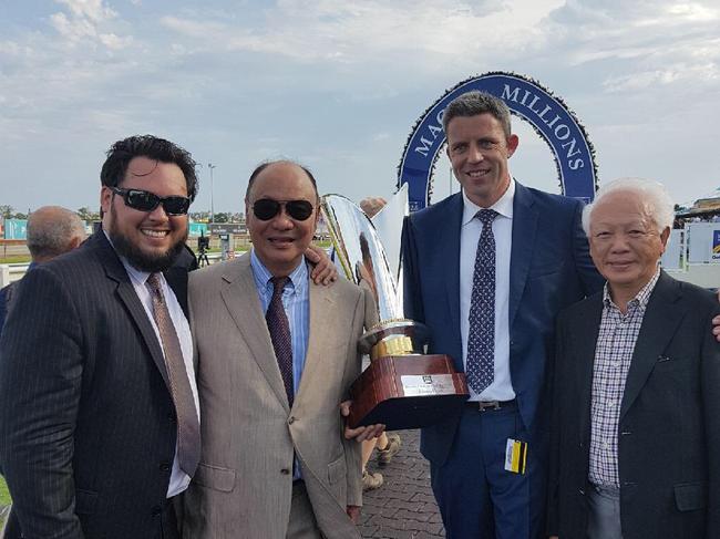 Justin Fung (left) with father Tony Fung, Aquis Australia CEO Shane McGrath and another connection. Picture: Supplied.