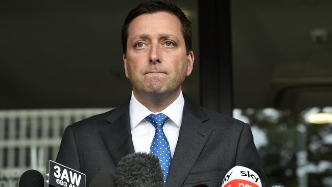 Opposition Leader Matthew Guy is grilled by reporters over the Liberal Party donor scandal. Picture: Andrew Henshaw