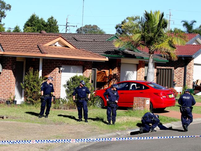 Police search for clues inside a drain.. Picture: Chris Pavlich