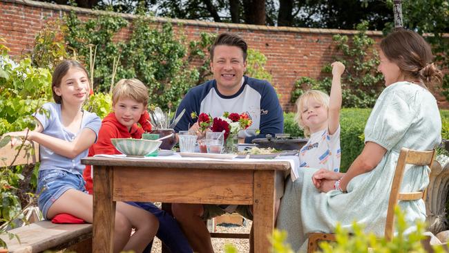 Jamie Oliver with his wife Jools and three of his five kids.