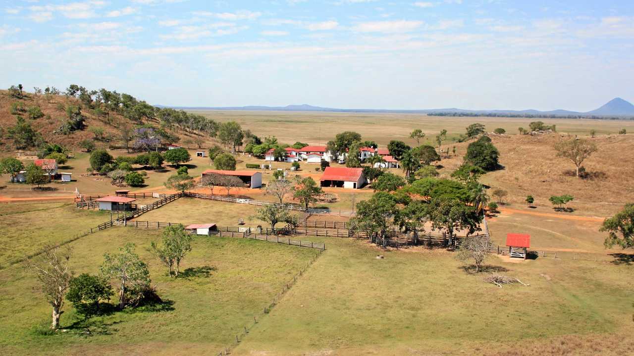 HOME SWEET HOM: An aerial view of the homestead at Toorilla Plains which runs 2,500 head of cattle. LEFT: Craig and Latisha Mace with their two children Will and Mekensi in their younger days . Picture: Toorilla Plains