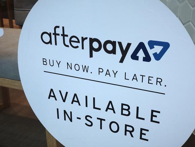 An Afterpay sign is seen in a store window in a shopping centre in Sydney, Tuesday, February 26, 2019. (AAP Image/Derek Rose) NO ARCHIVING