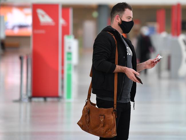 SYDNEY, AUSTRALIA - NewsWire Photos JUNE, 23, 2021: Travelers wearing masks at Sydney Domestic Airport in Sydney. Picture: NCA NewsWire/Joel Carrett