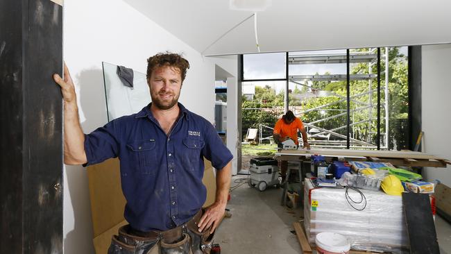 Builder Luke Eiszele of Eiszele constructions is booked out until July next year with Hobart City Council new housing approvals up. Picture: MATT THOMPSON