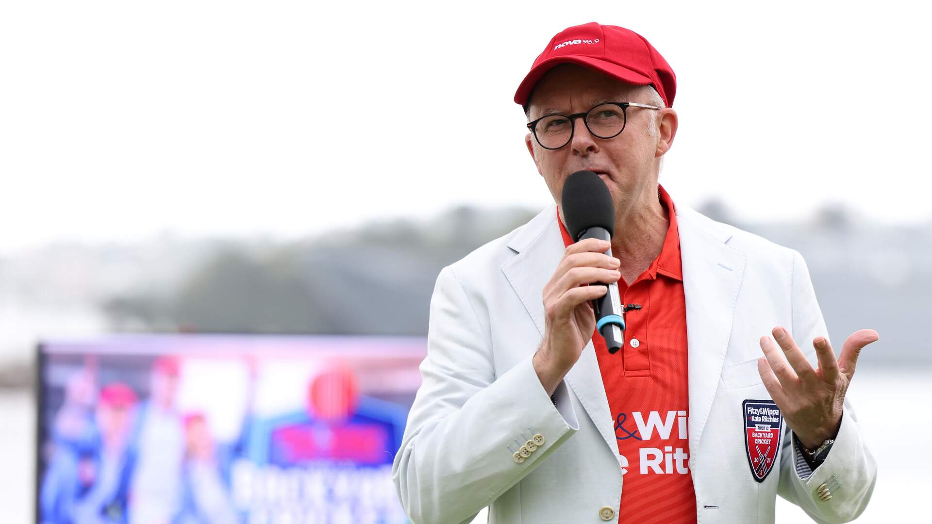 ‘For the cameras’: Albanese dons cricket outfit at Kirribilli House