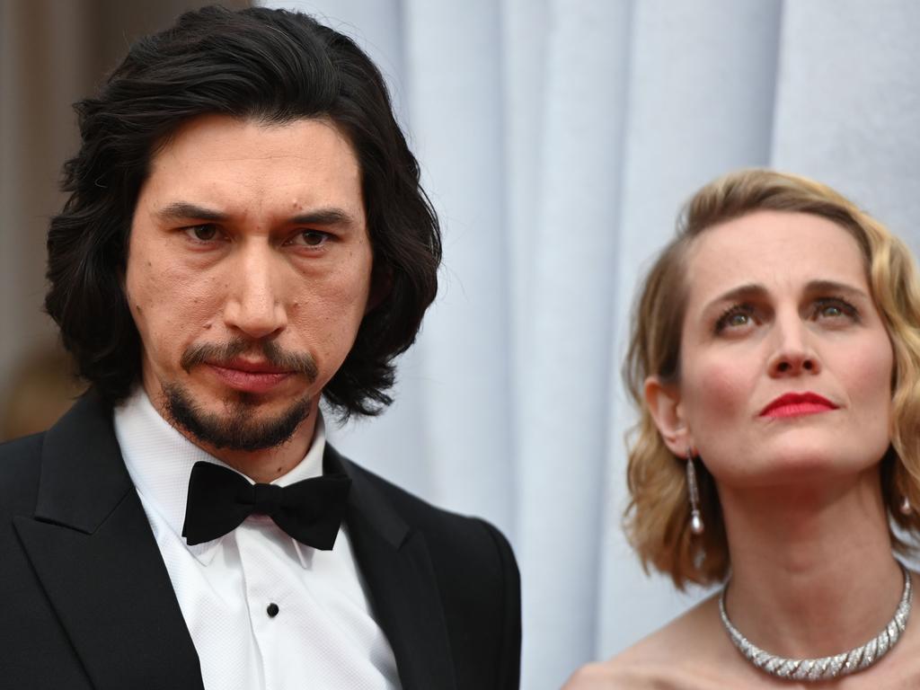 Kylo Ren ... sorry, we mean Adam Driver ... escorts his wife Joanne Tucker on the red carpet. Picture: AFP