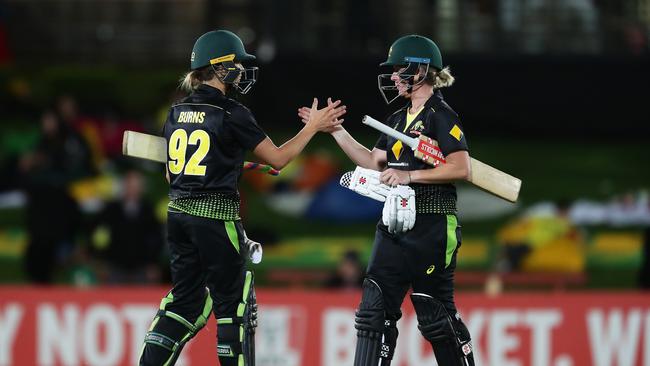 Erin Burns (L) and Beth Mooney (R) steered Australia to victory. Picture: Getty