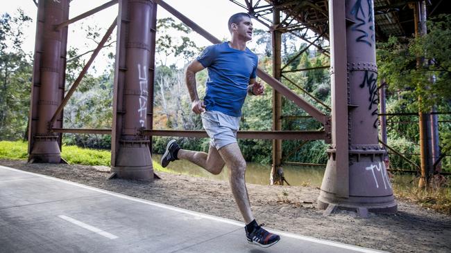 Jonathan Brown pounds the pavement training for the New York marathon. Picture: Nicole Cleary